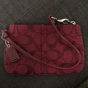 Coach burgundy cloth wristlet